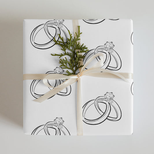 Custom printed wrapping paper with black and white wedding ring illustrations tied with cream ribbon and greenery. - Wedding Rings Wrapping paper sheets - Default Title